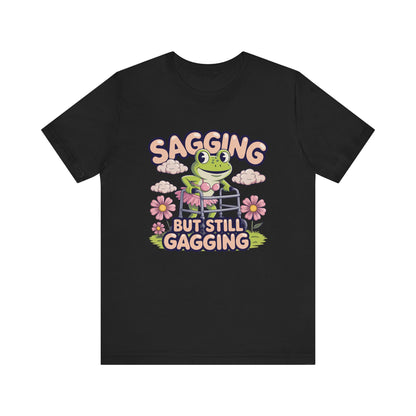 Black t-shirt with a frog graphic and text on a white background